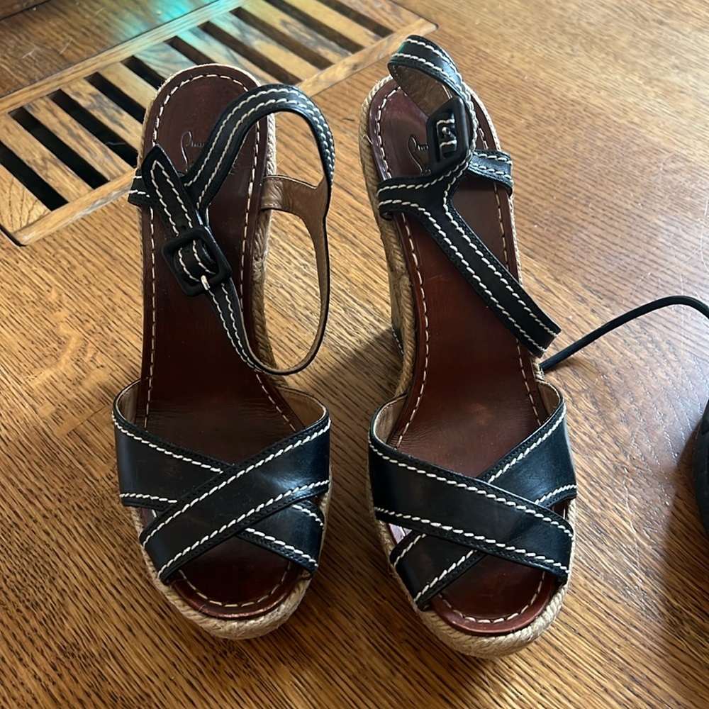 Christian Louboutain wedge shoe black.